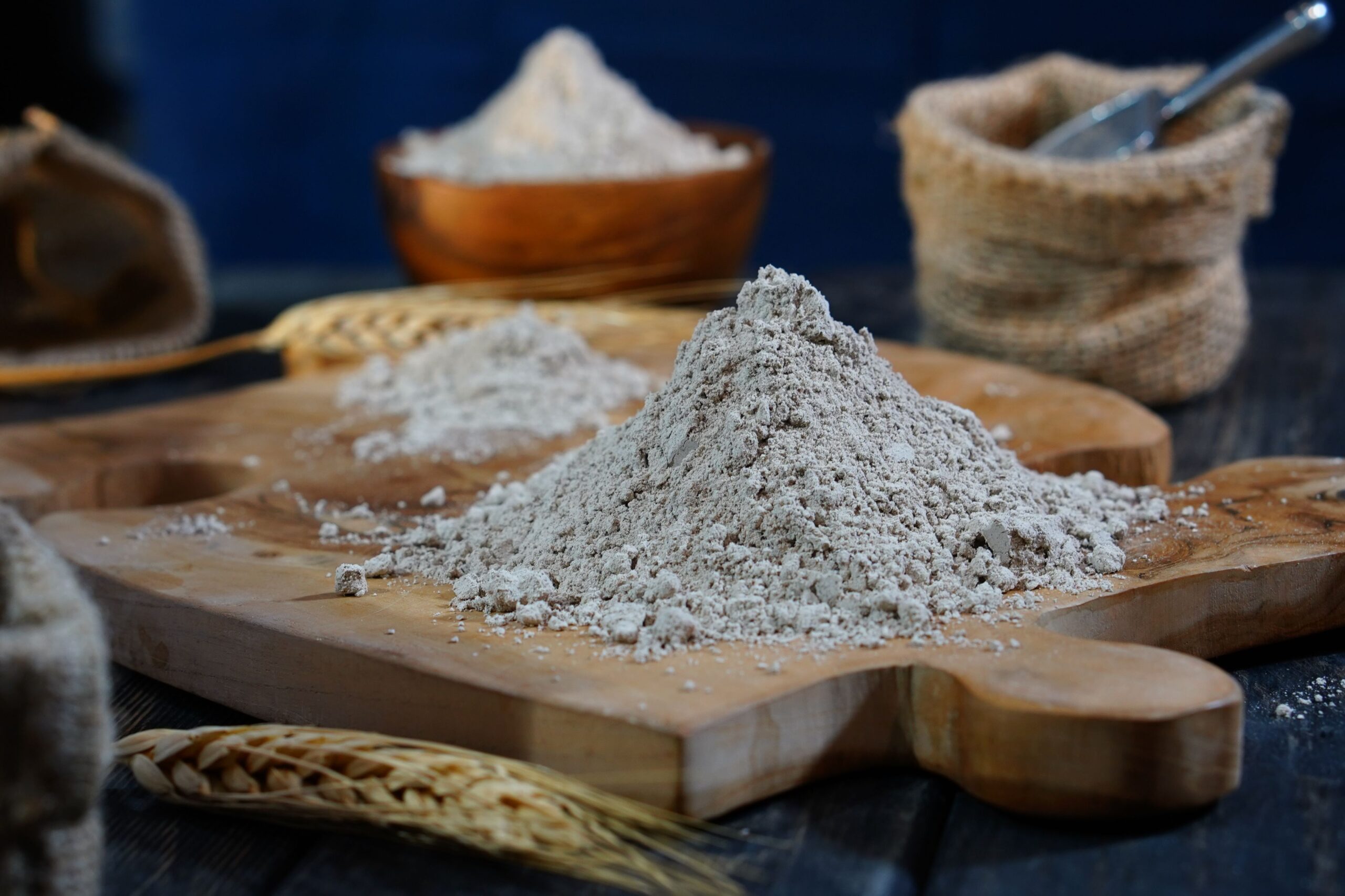 Different flour varieties including all-purpose and whole wheat flour displayed side by side