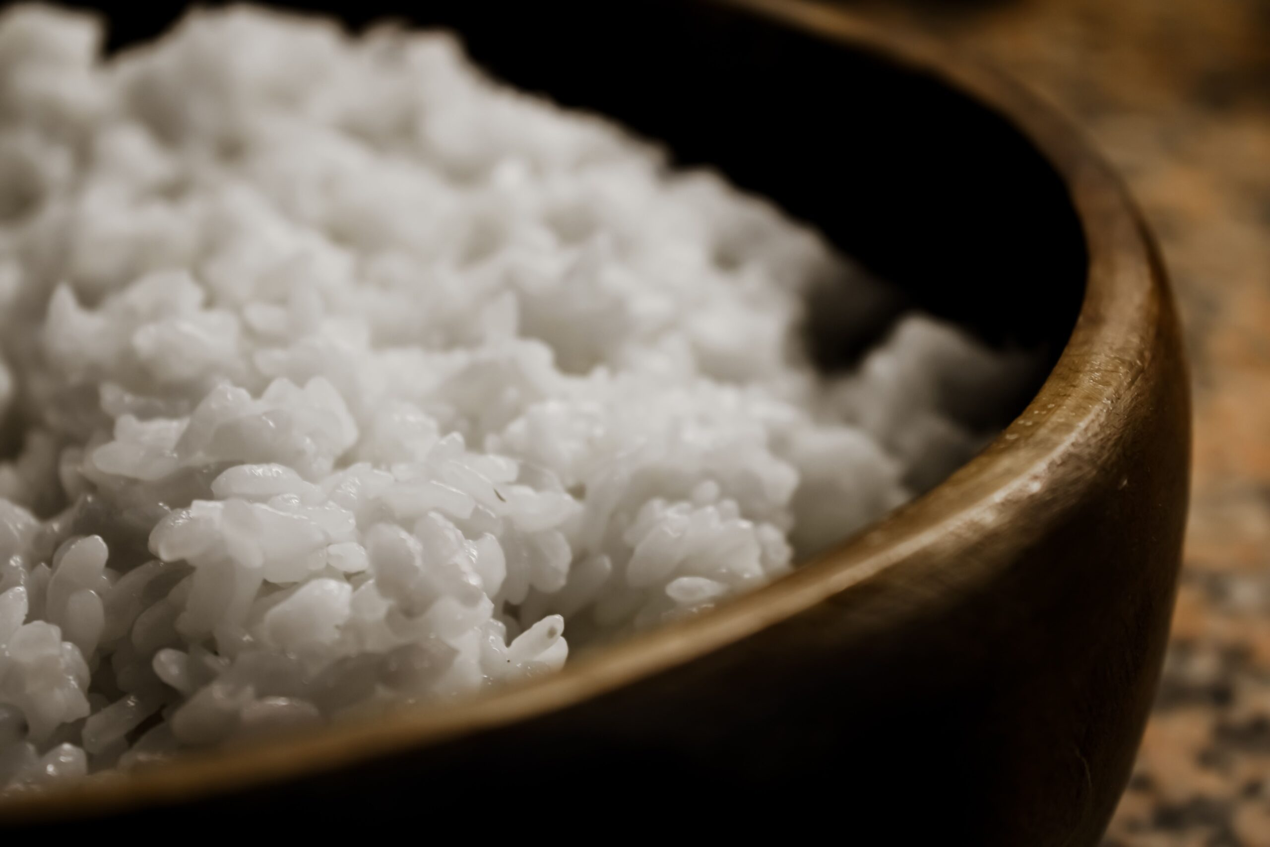Fluffy cooked white rice with separated grains ready to serve