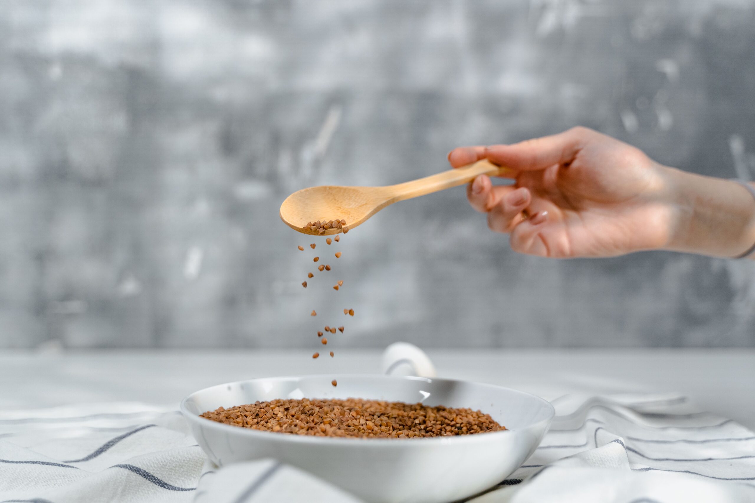 Bowl of ground flaxseed used to prepare a flax egg for vegan baking