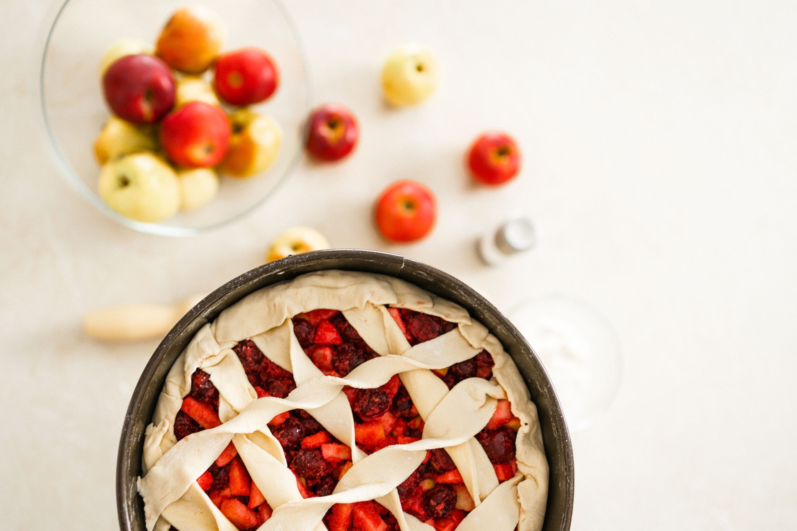 Overhead flat lay of dairy-free baking ingredients including plant-based butter alternatives, oils, and applesauce